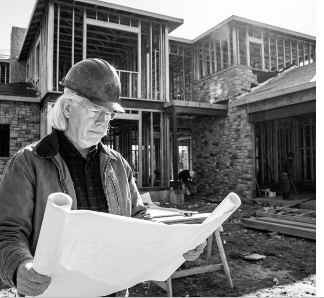 Michael Hyden looking at plans